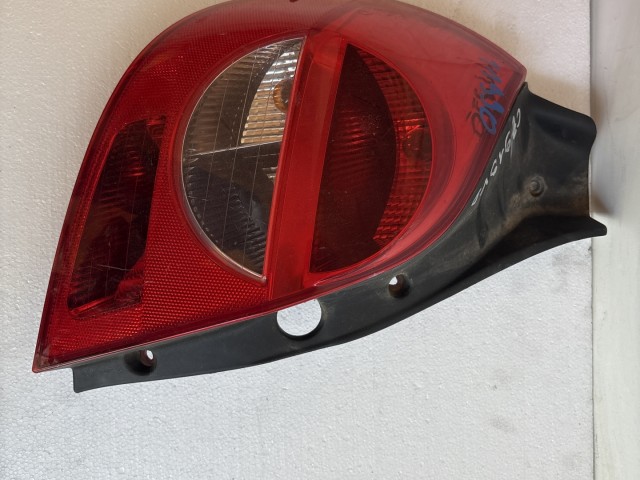 11990 Renault Clio III. 2007-2014 Lámpa , Fényszóró Használt Bal hátsó