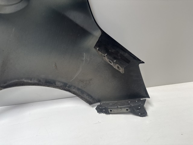 12425 Opel Meriva B 2010-2017 Bal első Sárvédő HasználtFekete  Z22C sérült