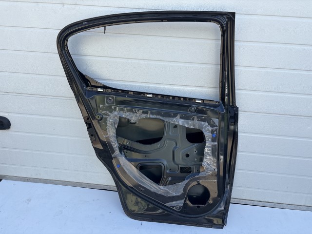 12750 Opel Corsa E Ajtó Használt Bal hátsó Fekete Z22c