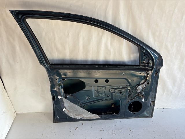 13223 Opel H astra Bal első  Ajtó Zöld Z21u sérült