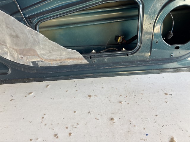 13223 Opel H astra Bal első  Ajtó Zöld Z21u sérült