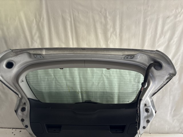 13489 Opel Astra J 2009-2015 Csomagtérajtó Használt Z176 Ezüst 5 ajtós