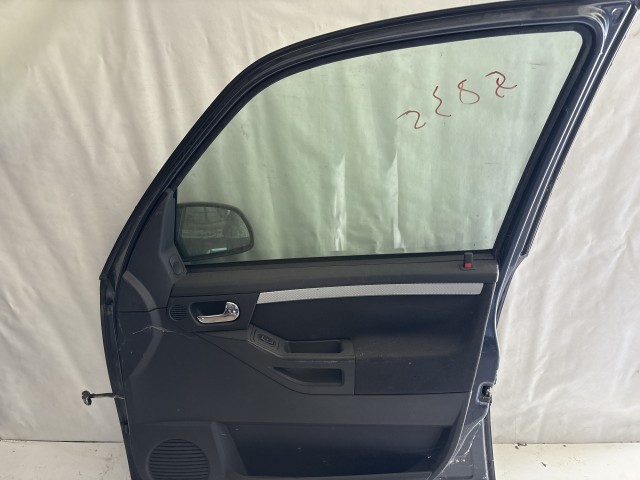 13637 Opel Meriva A 2003-2010 Jobb első Ajtó Használt Fekete Z168 a képen látható sérüléssel