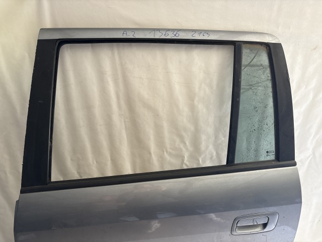 13636 Opel Meriva A 2003-2010 Bal hátsó Ajtó Használt Ezüst Z163