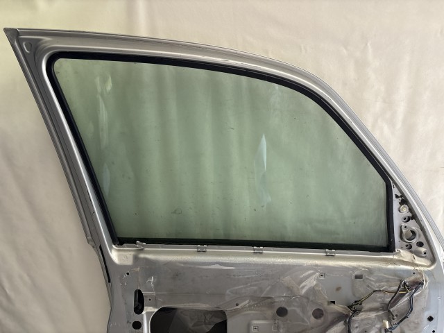 1152 Opel Meriva A Bal első 2003-2010 Ajtó Használt Ezüst Z157