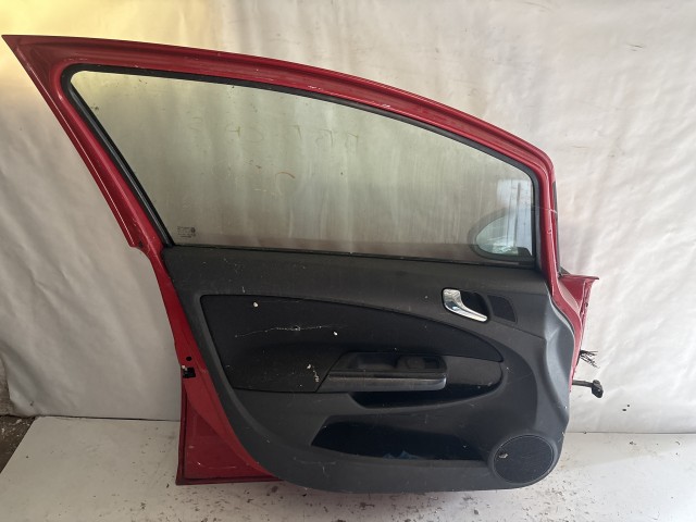 13778 Opel Corsa D 2006-2014 Ajtó Használt Bal első Piros  a képen látható sérüléssel