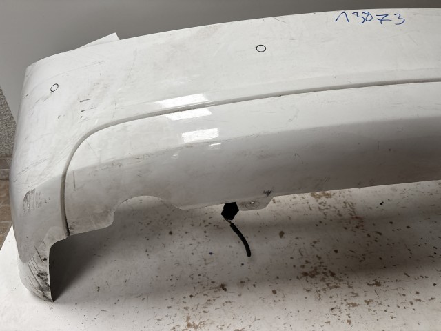 13873 Chevrolet Cruze 2010-2014 Lökhárító Használt hátsó Fehér  a képen látható sérüléssel