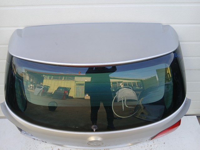 14461 Opel Astra J kombi Csomagtérajtó Ezüst Z176