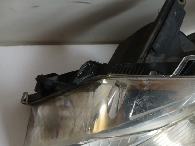 14501 Opel Astra H 2004-2010 Bal első Lámpa Fényszóró  a képen látható sérüléssel