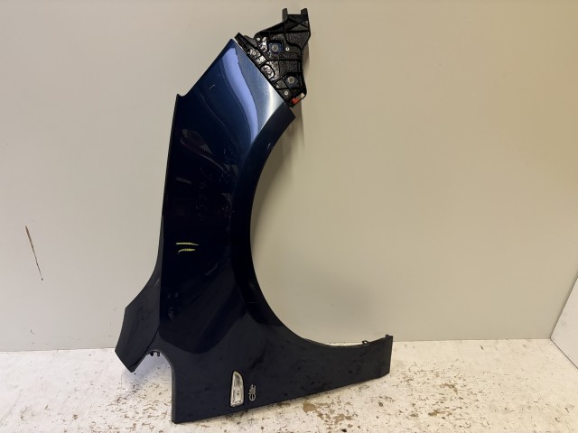 15246 Opel Astra J Jobb első Sárvédő Használt Kék