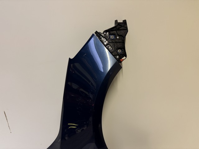 15246 Opel Astra J Jobb első Sárvédő Használt Kék