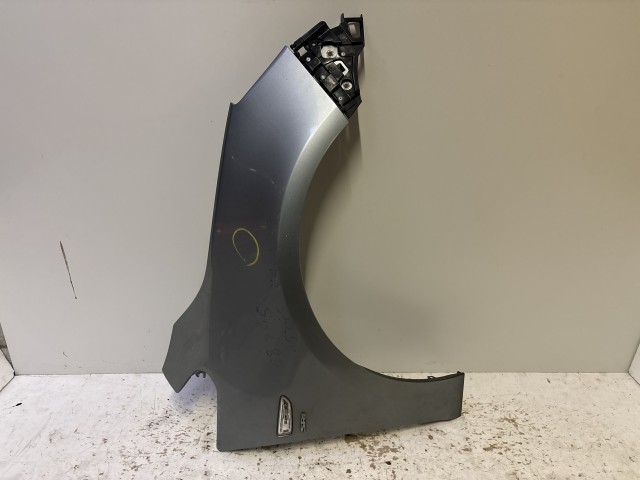 15245 Opel Astra J 2009-2015 Jobb első Sárvédő Szürke  Z179