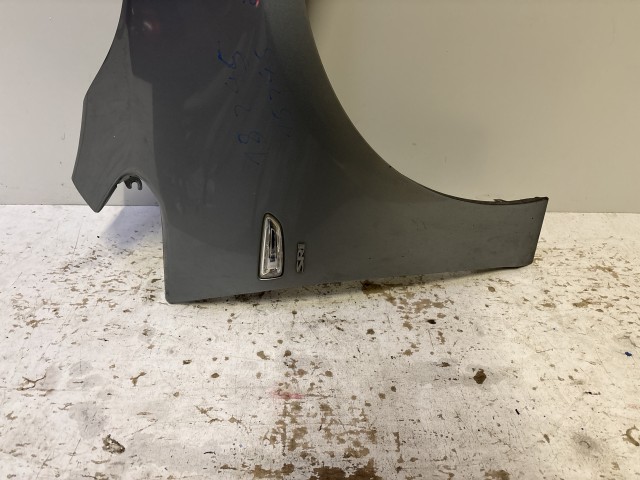 15245 Opel Astra J 2009-2015 Jobb első Sárvédő Szürke  Z179