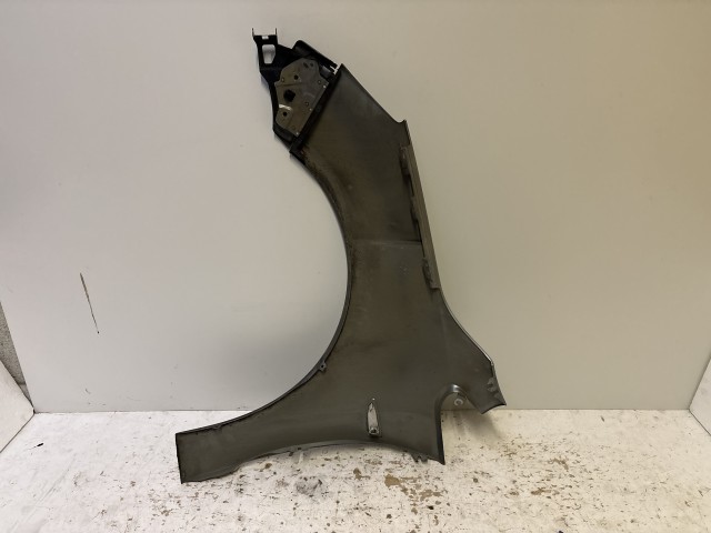 15245 Opel Astra J 2009-2015 Jobb első Sárvédő Szürke  Z179