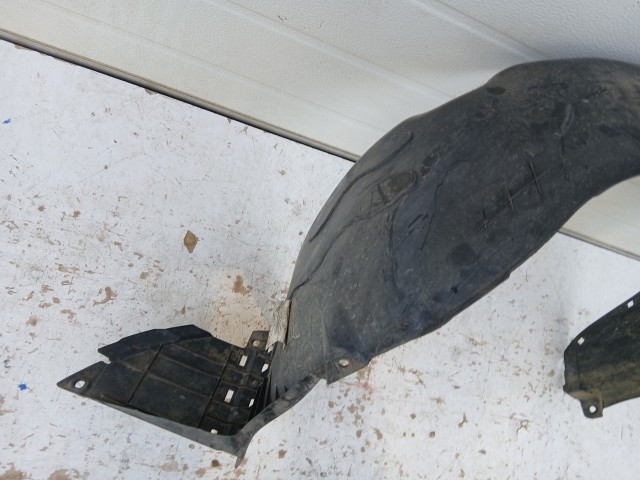 Kia Rio III.(UB) 2011-2017 jobb első Kerékjárati dobbetét Használt