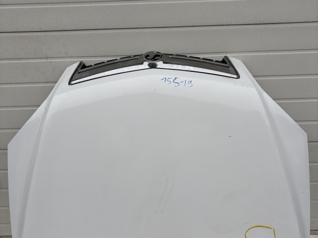 15519 Opel Antara 2006-2015 Motorháztető Használt Fehér   a képen látható sérüléssel