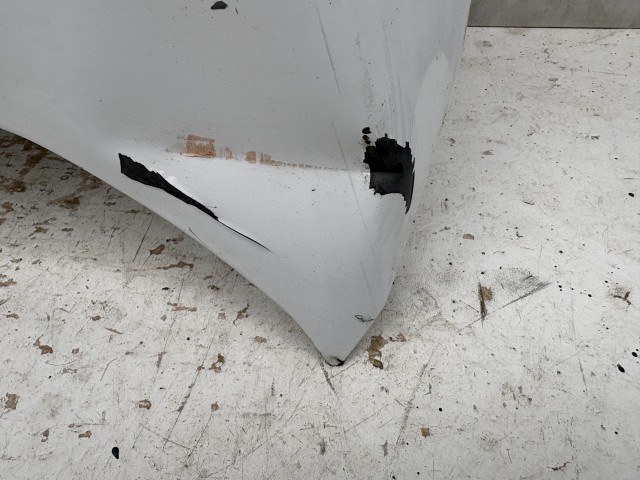 15519 Opel Antara 2006-2015 Motorháztető Használt Fehér   a képen látható sérüléssel