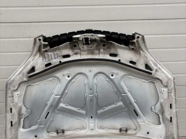 15519 Opel Antara 2006-2015 Motorháztető Használt Fehér   a képen látható sérüléssel