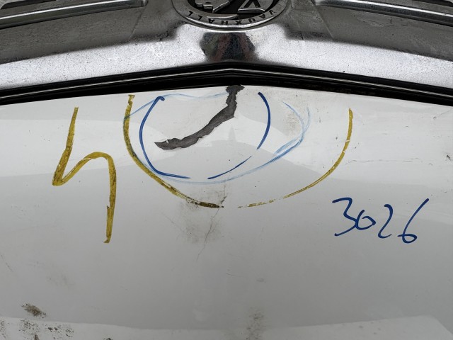 15520 Opel Antara 2006-2015 Motorháztető Használt Fehér   a képen látható sérüléssel