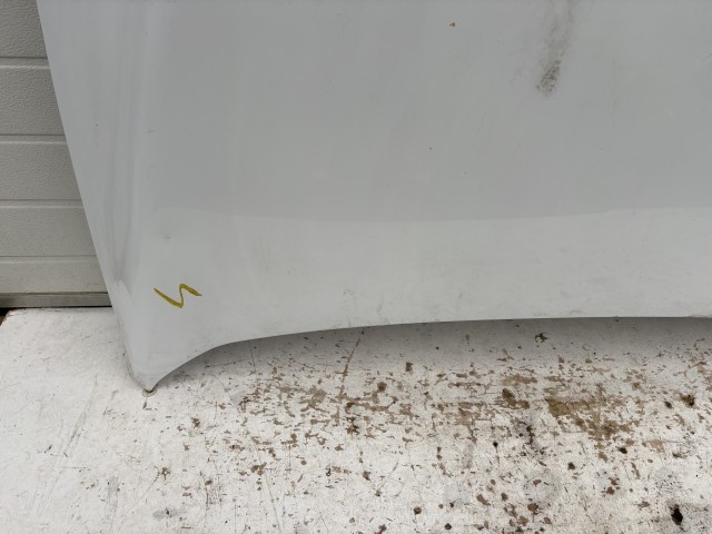 15520 Opel Antara 2006-2015 Motorháztető Használt Fehér   a képen látható sérüléssel