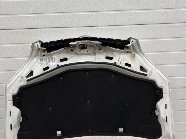 15520 Opel Antara 2006-2015 Motorháztető Használt Fehér   a képen látható sérüléssel