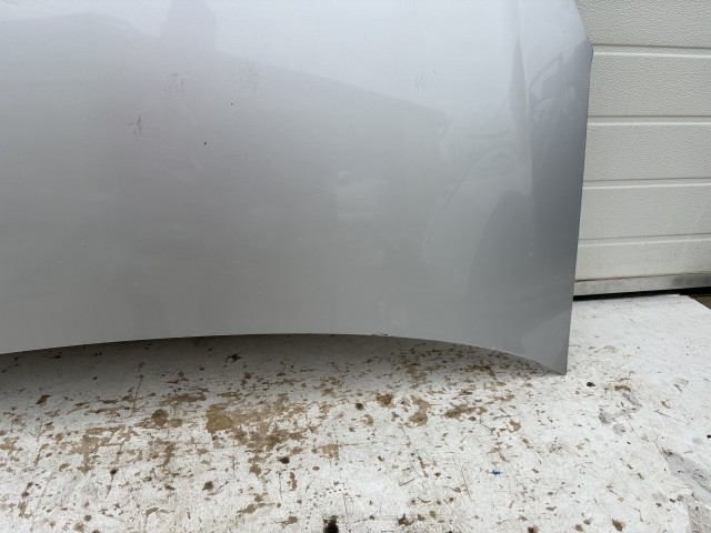 15998 Opel Zafira B Motorháztető Használt Ezüst Z176 