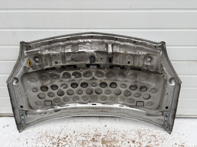 15998 Opel Zafira B Motorháztető Használt Ezüst Z176 