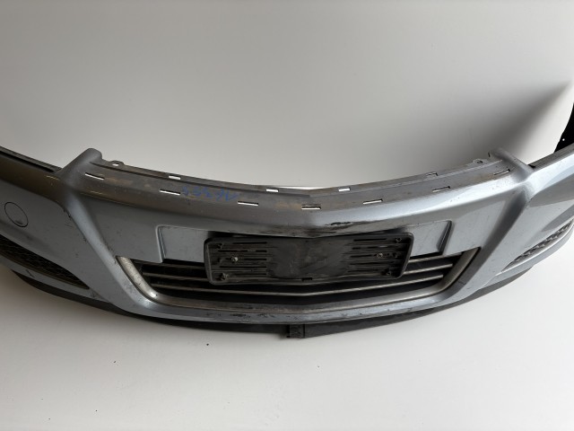 16355 Opel Astra H első Lökhárító Kékes szürke Z163