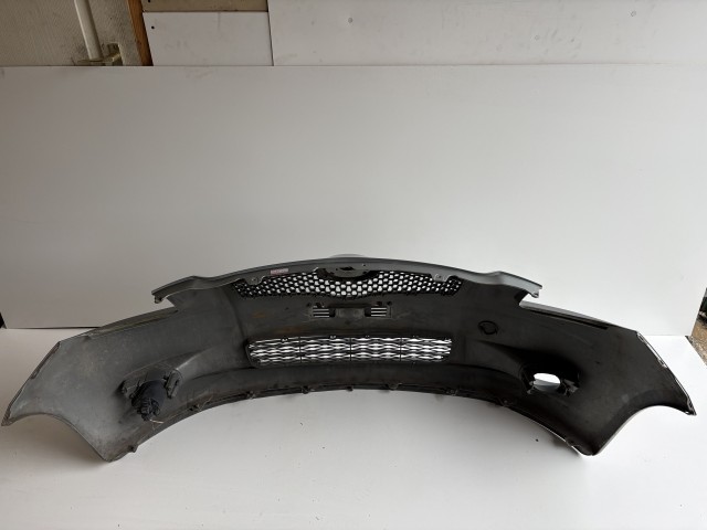 16358 Toyota Yaris II. első Lökhárító Szürke