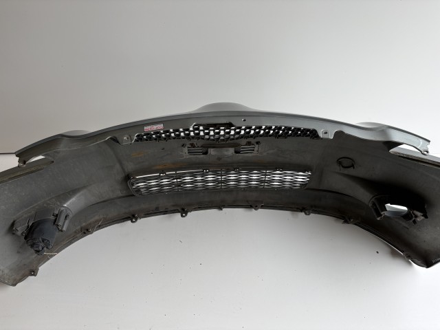 16358 Toyota Yaris II. első Lökhárító Szürke