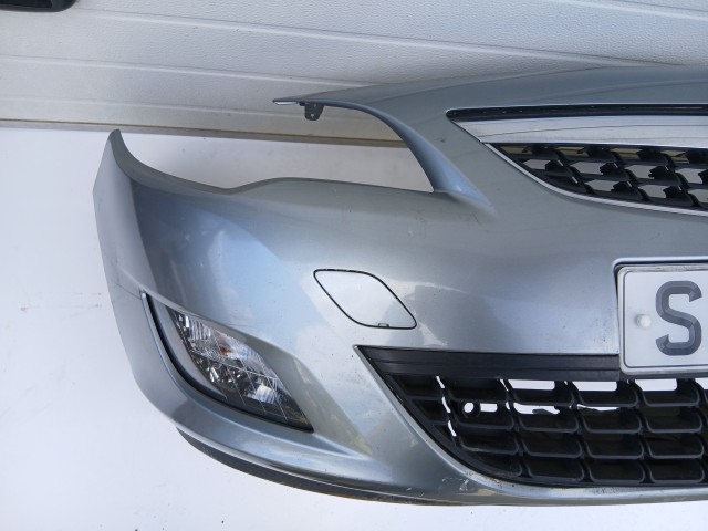 16857 Opel Astra J 2009-2012 első  Lökhárító Szürke Z179