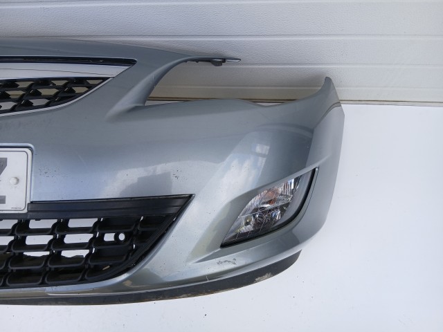 16857 Opel Astra J 2009-2012 első  Lökhárító Szürke Z179