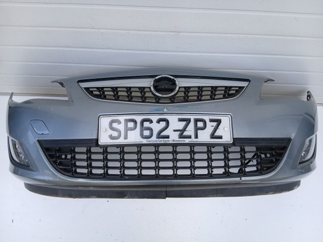 16857 Opel Astra J 2009-2012 első  Lökhárító Szürke Z179