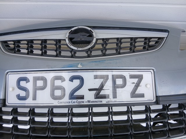 16857 Opel Astra J 2009-2012 első  Lökhárító Szürke Z179