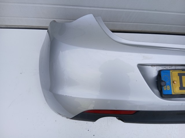 16881 Opel Astra J 2009-2015 hátsó Lökhárító Használt Ezüst 5 ajtós