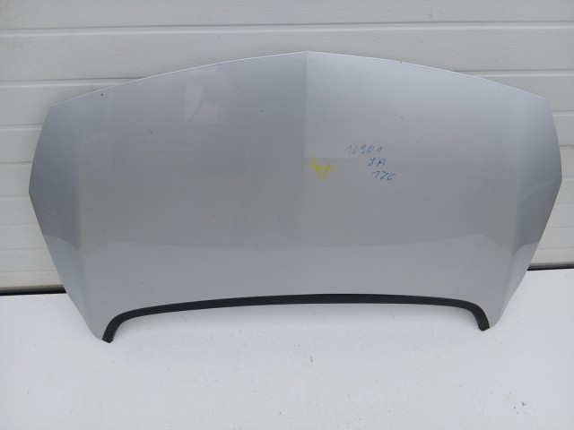 16901 Opel Astra J 2009-2015 Motorháztető Használt Ezüst Z176 