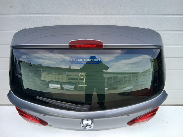 16989 Opel Corsa E 2014- 2014-2019 Csomagtérajtó Használt Grafit 