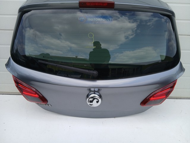 16989 Opel Corsa E 2014- 2014-2019 Csomagtérajtó Használt Grafit 