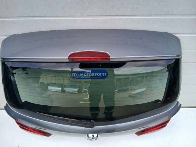 16989 Opel Corsa E 2014- 2014-2019 Csomagtérajtó Használt Grafit 