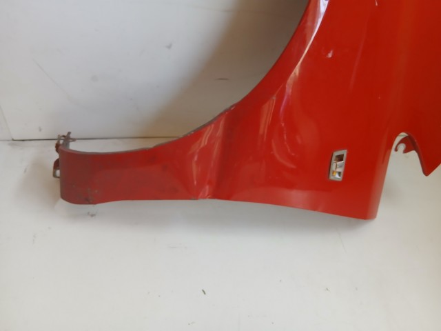 17309 Opel Corsa D 2006-2014 Bal első Sárvédő Piros  a képen látható sérüléssel