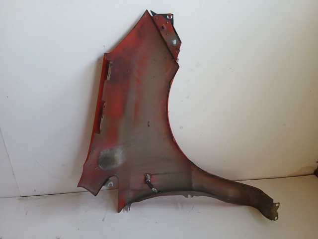 17309 Opel Corsa D 2006-2014 Bal első Sárvédő Piros  a képen látható sérüléssel