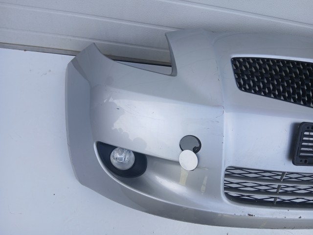 17361 Toyota Yaris II. 2005-2011(xp90) 2005-2011első Lökhárító Ezüst 