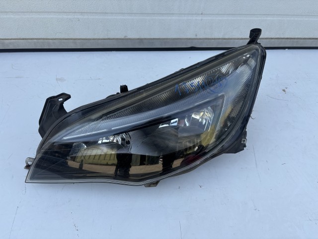 17511 Opel Astra J 2009-2015 Lámpa , Fényszóró Használt Bal első 