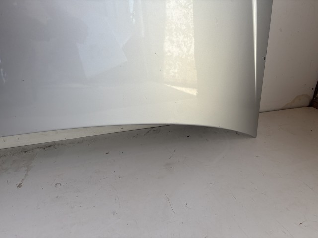 18184 Opel Astra H 2004-2010 Motorháztető Használt Ezüst Z157 
