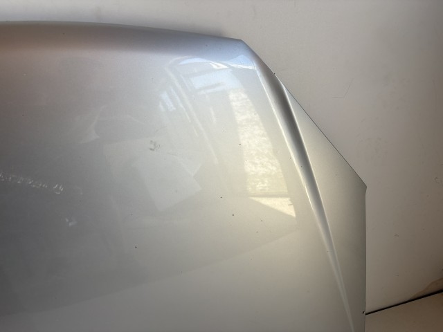 18184 Opel Astra H 2004-2010 Motorháztető Használt Ezüst Z157 