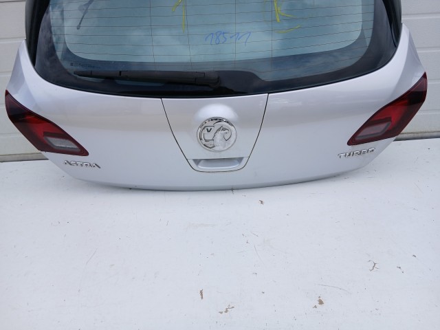 18511 Opel Astra J 2009-2015 Csomagtérajtó Z176 Ezüst 5 ajtós