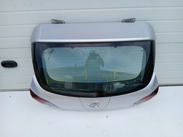 18511 Opel Astra J 2009-2015 Csomagtérajtó Z176 Ezüst 5 ajtós
